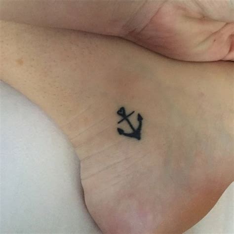 Anchor Tattoo With A Heart Shaped Ring On Kalee Ankle