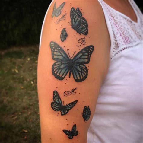 Butterfly Tattoo On Upper Arm