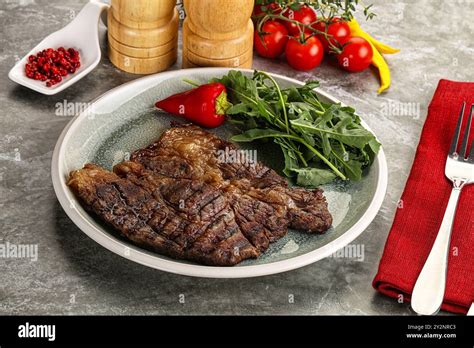 Premium Photo Grilled Chuck Roll Beef Steak With Arugula