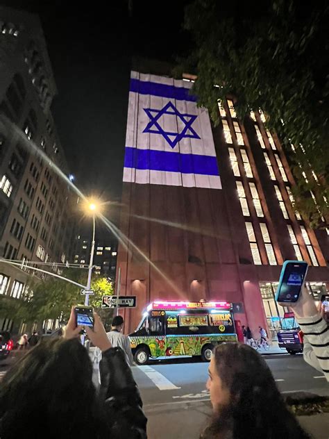 Tisch Family Members Project Faces Of Israeli Hostages On Nyu Building