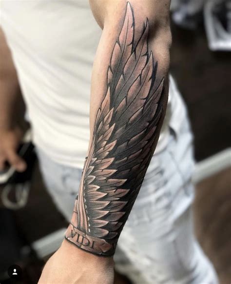 Wing Forearm Tattoo 35 Breathtaking Wings Tattoo Designs